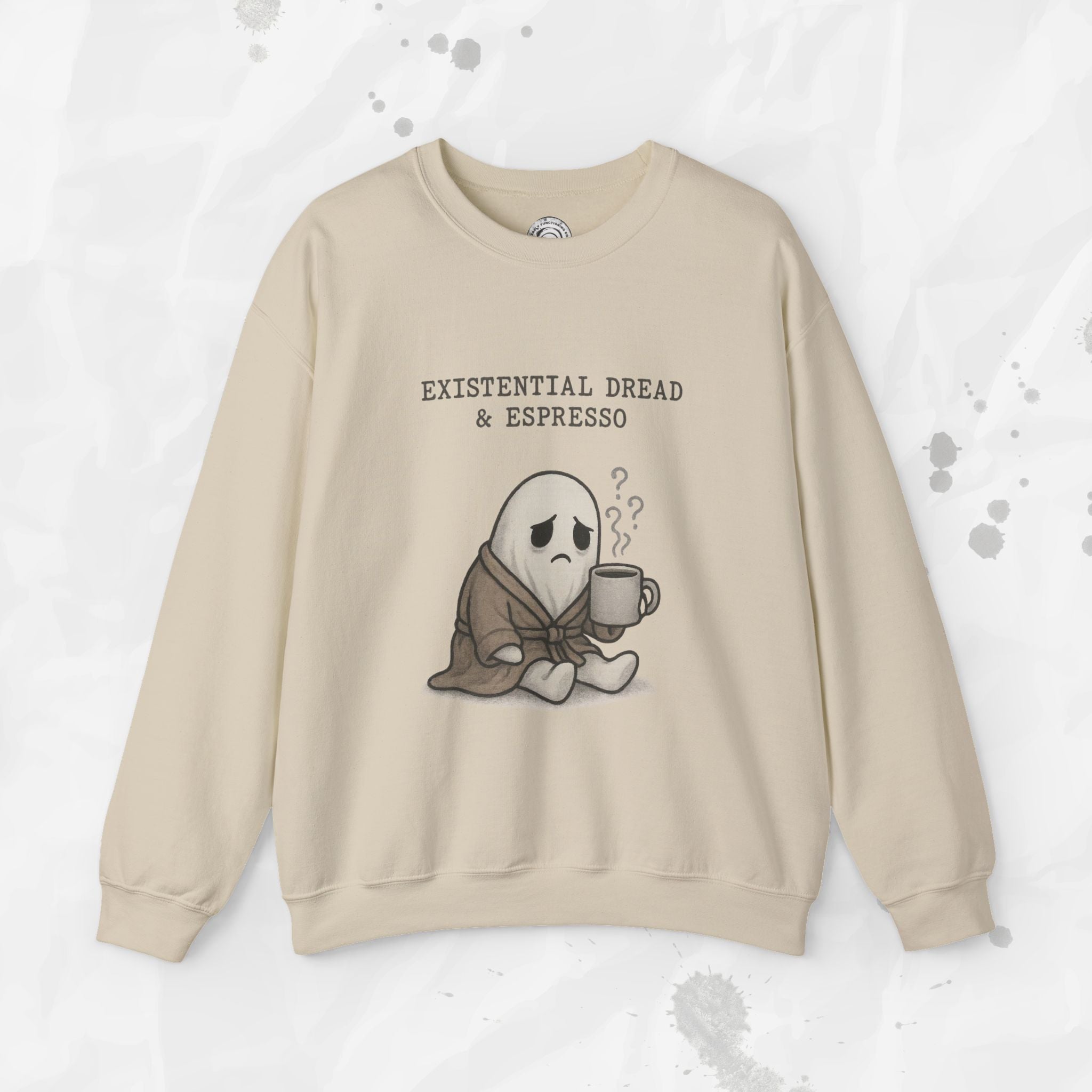 Beige sweatshirt with ghost holding a coffee cup graphic and text 'Existential Dread & Espresso' on a light gray background.