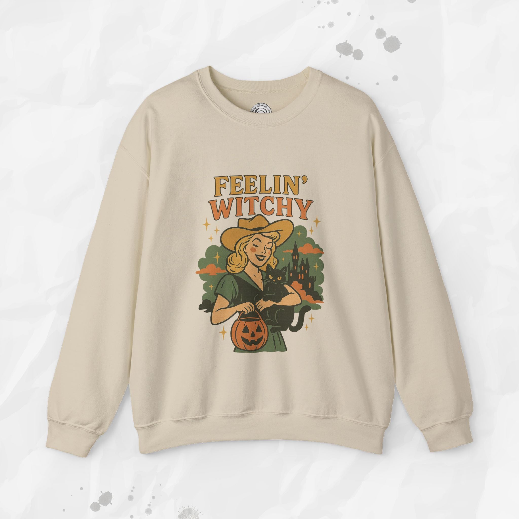 Beige sweatshirt with 'Feelin' Witchy' graphic design on a white background