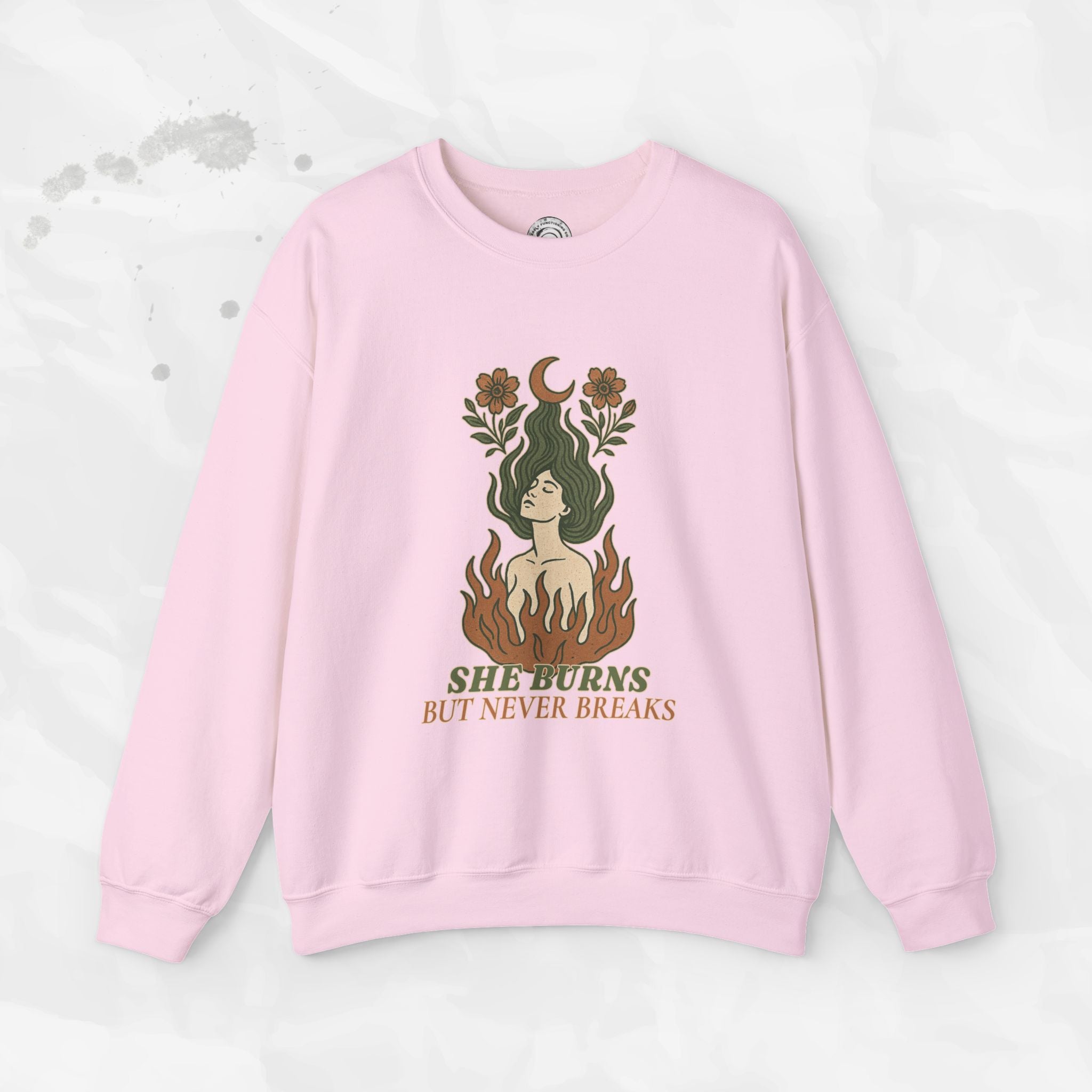 She Burns But Never Breaks – Crewneck Sweatshirt