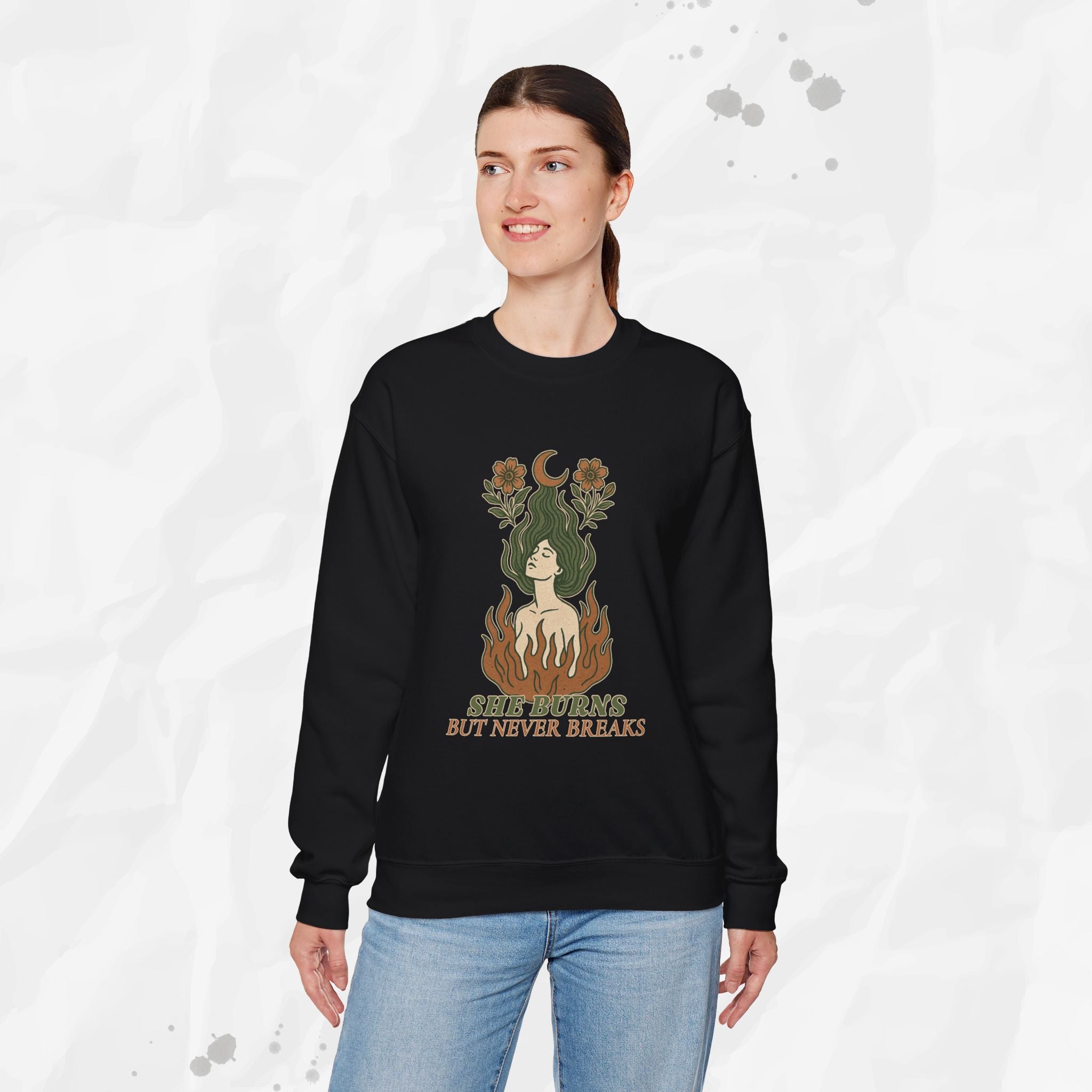 She Burns But Never Breaks – Crewneck Sweatshirt