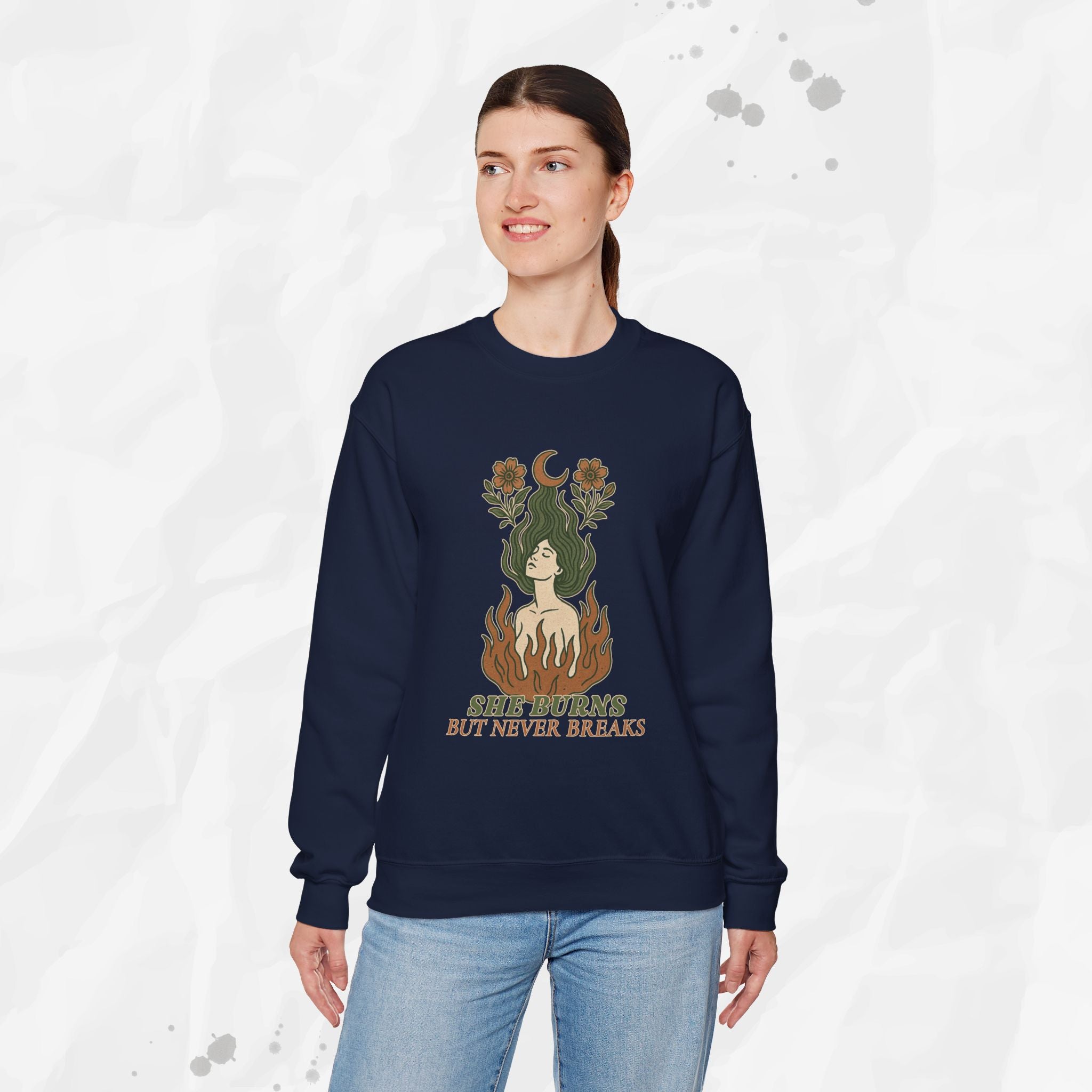 She Burns But Never Breaks – Crewneck Sweatshirt