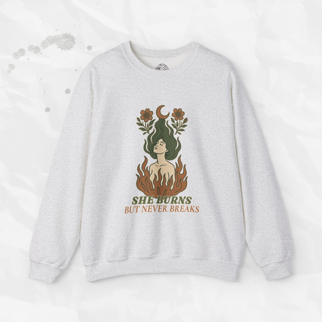 She Burns But Never Breaks – Crewneck Sweatshirt