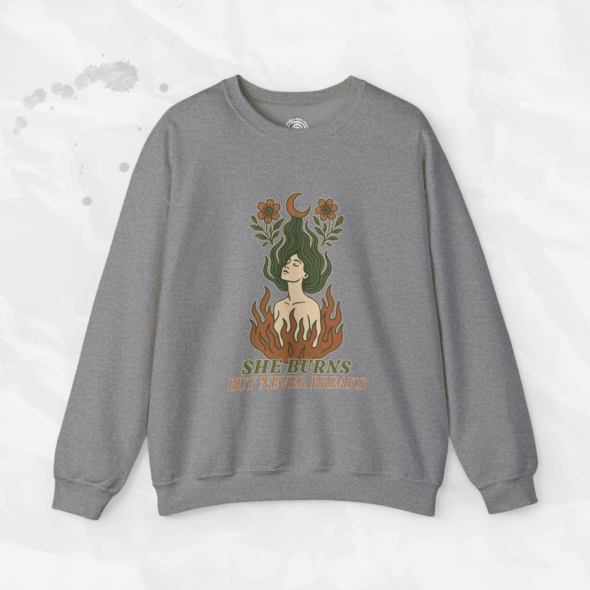 She Burns But Never Breaks – Crewneck Sweatshirt