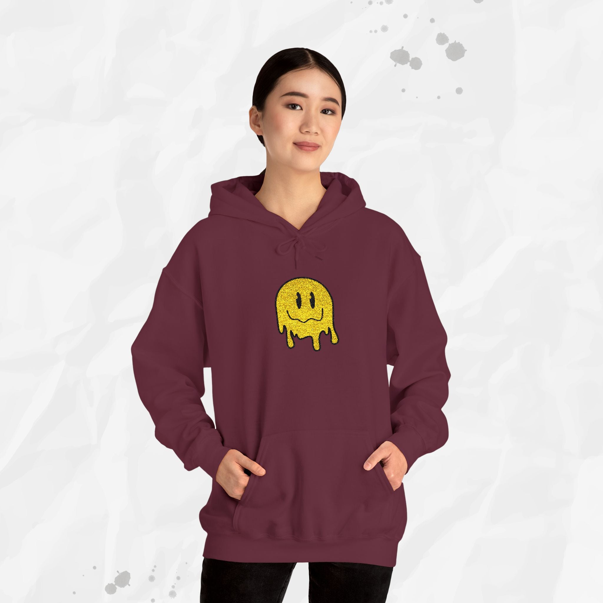 Sweat à capuche brodé Melty Smiley