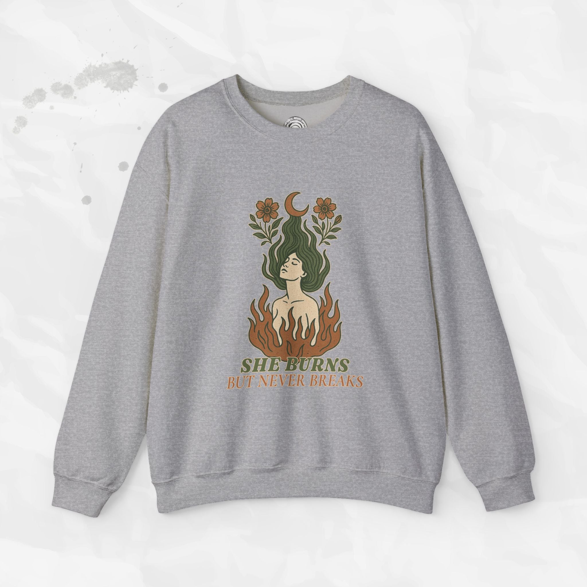 She Burns But Never Breaks – Crewneck Sweatshirt