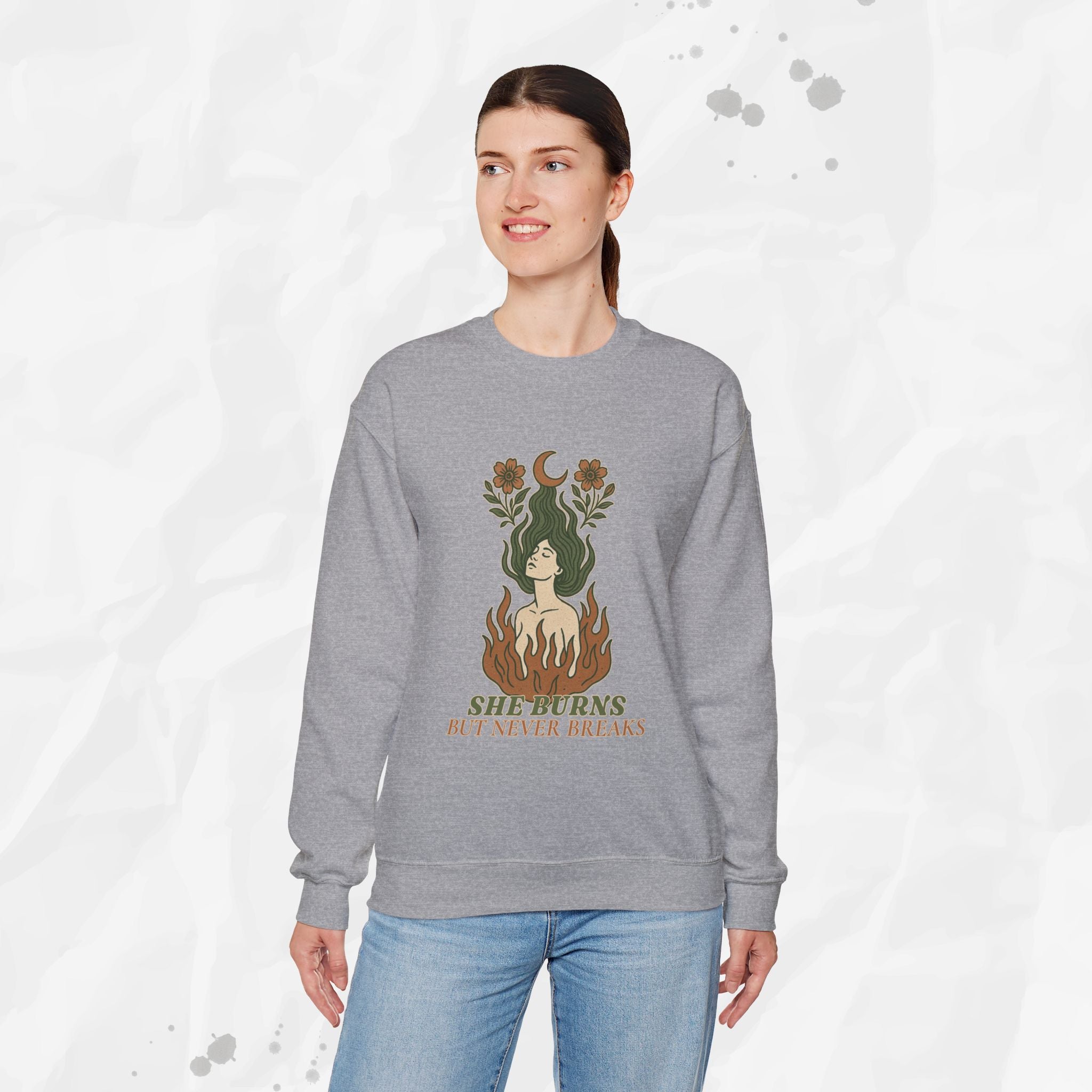 She Burns But Never Breaks – Crewneck Sweatshirt