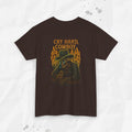 Brown t-shirt with a graphic design and text 'Cry Hard, Cowboy' on a white background