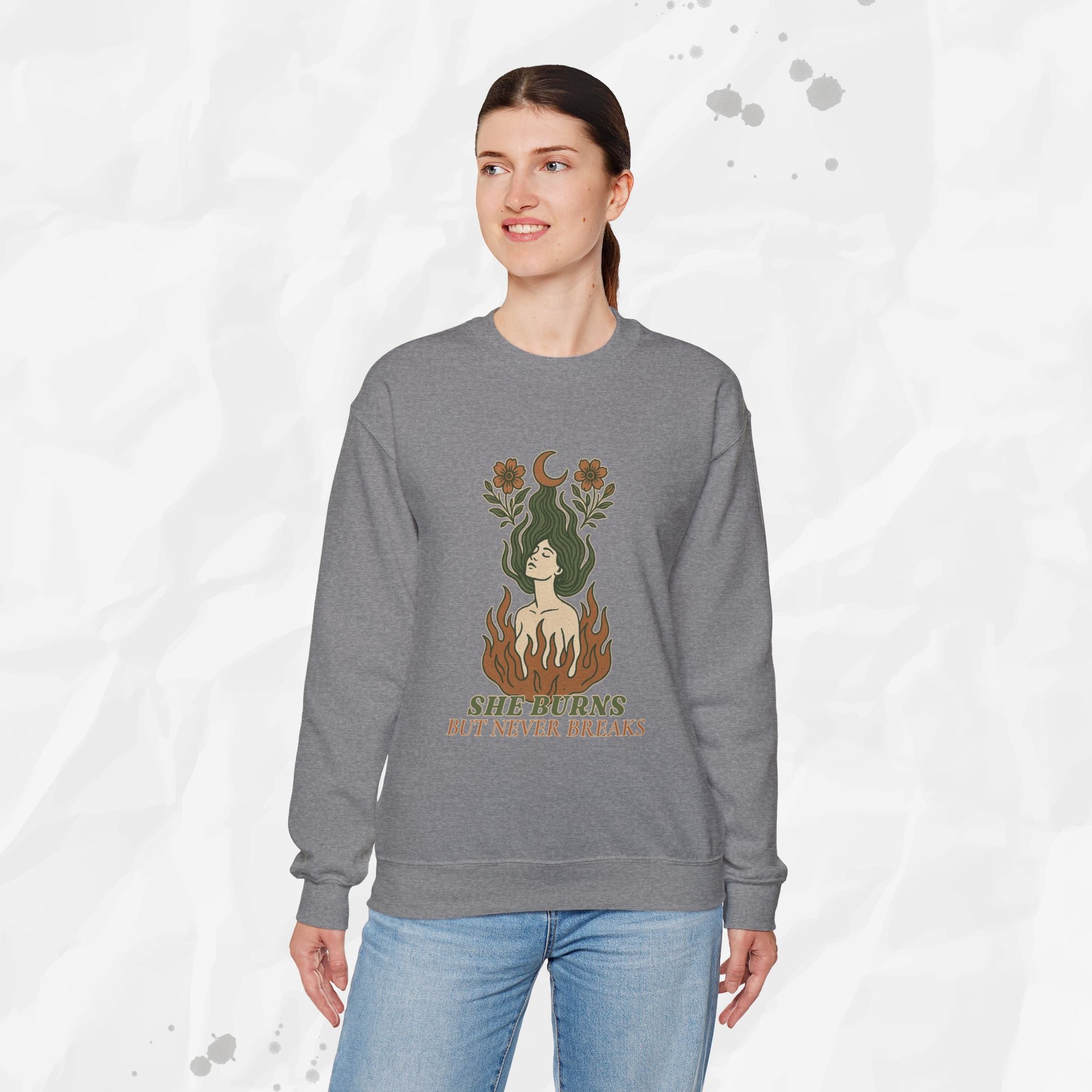 She Burns But Never Breaks – Crewneck Sweatshirt