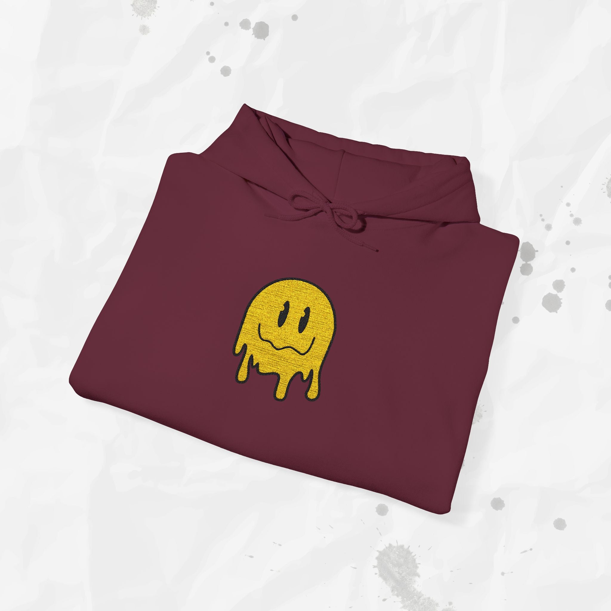 Sweat à capuche brodé Melty Smiley