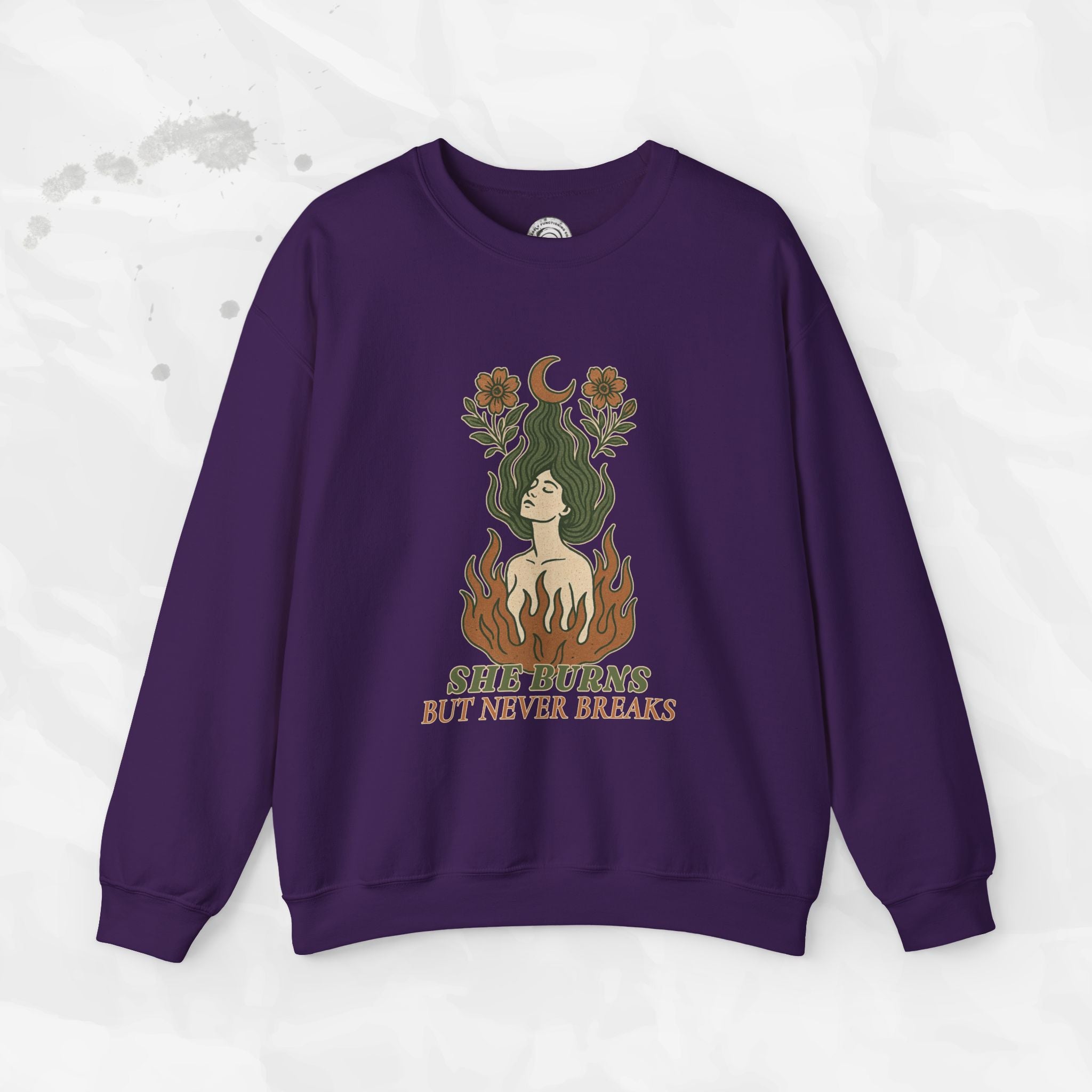 She Burns But Never Breaks – Crewneck Sweatshirt