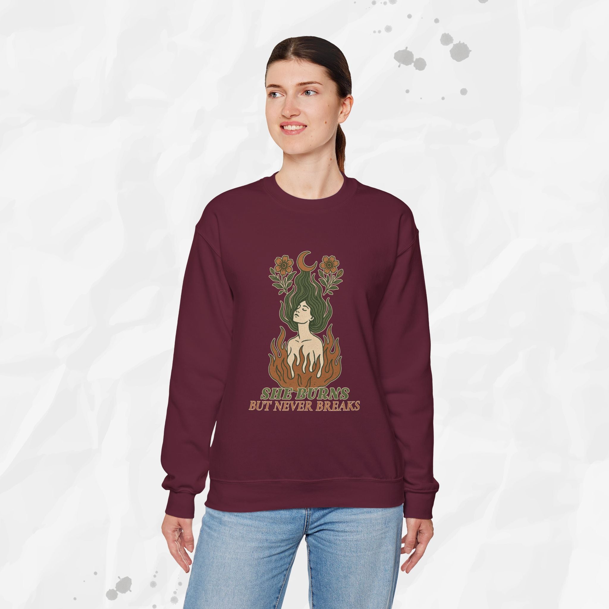 She Burns But Never Breaks – Crewneck Sweatshirt
