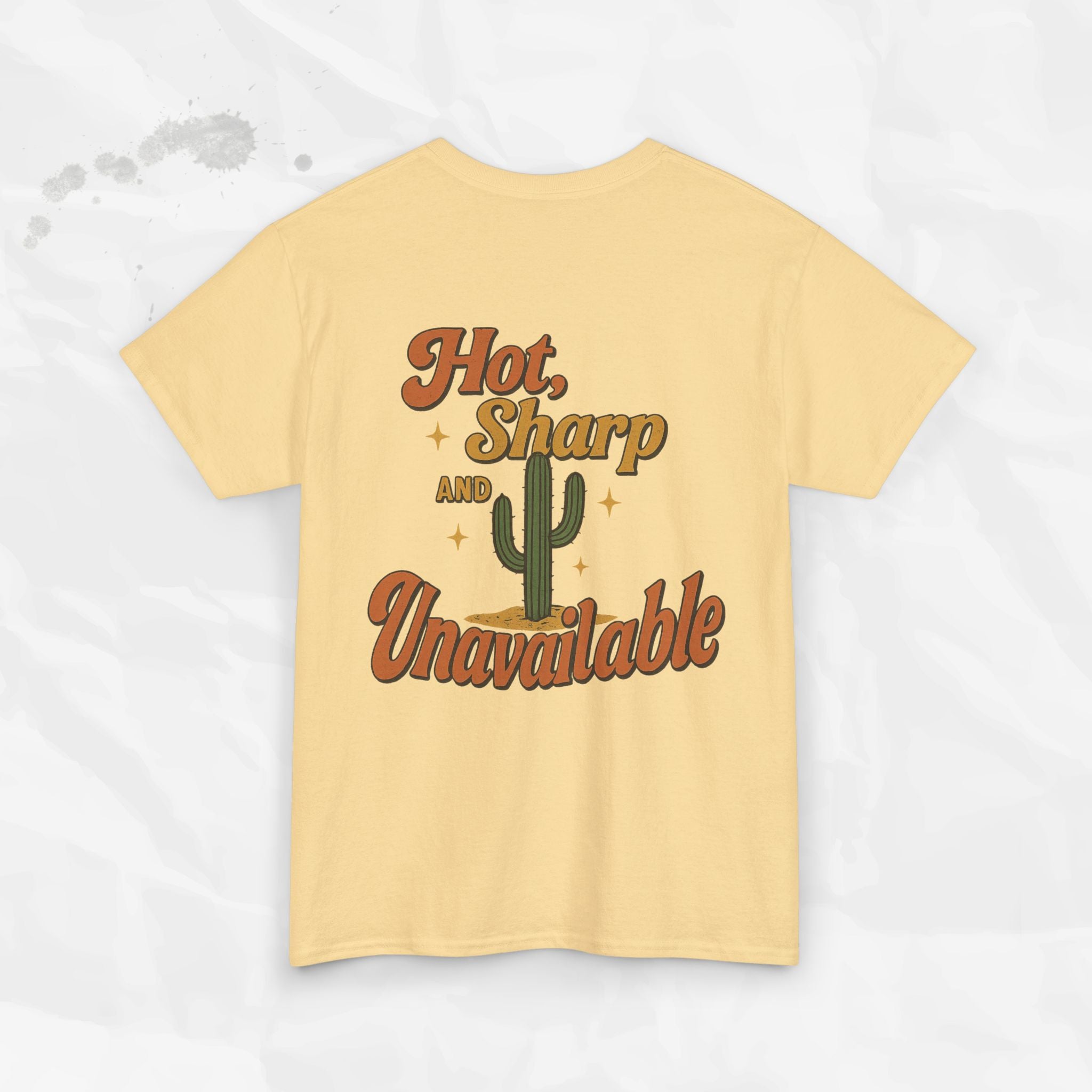 Beige t-shirt with a cactus graphic and text on a white background