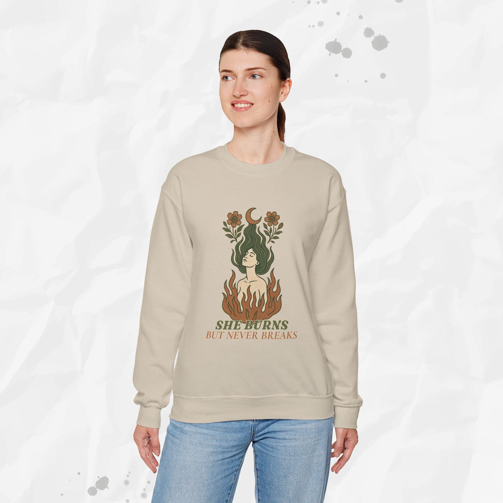 She Burns But Never Breaks – Crewneck Sweatshirt